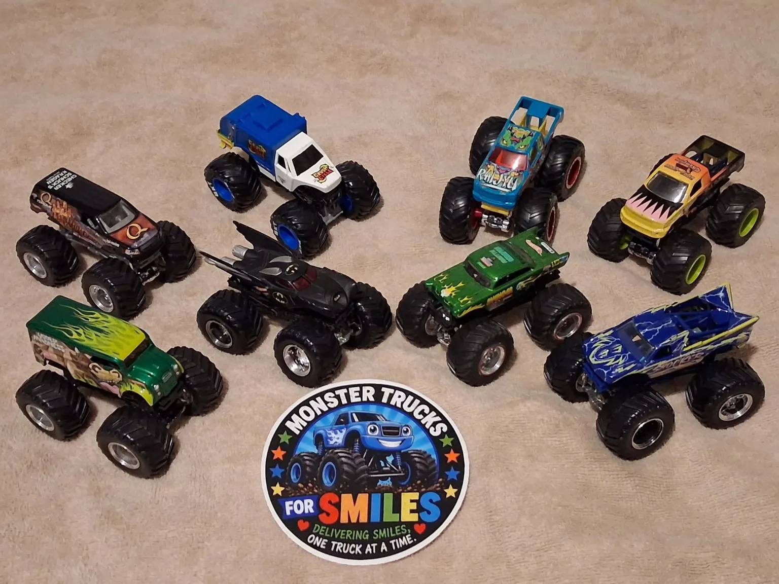 The original collection represented by colorful real toy monster trucks