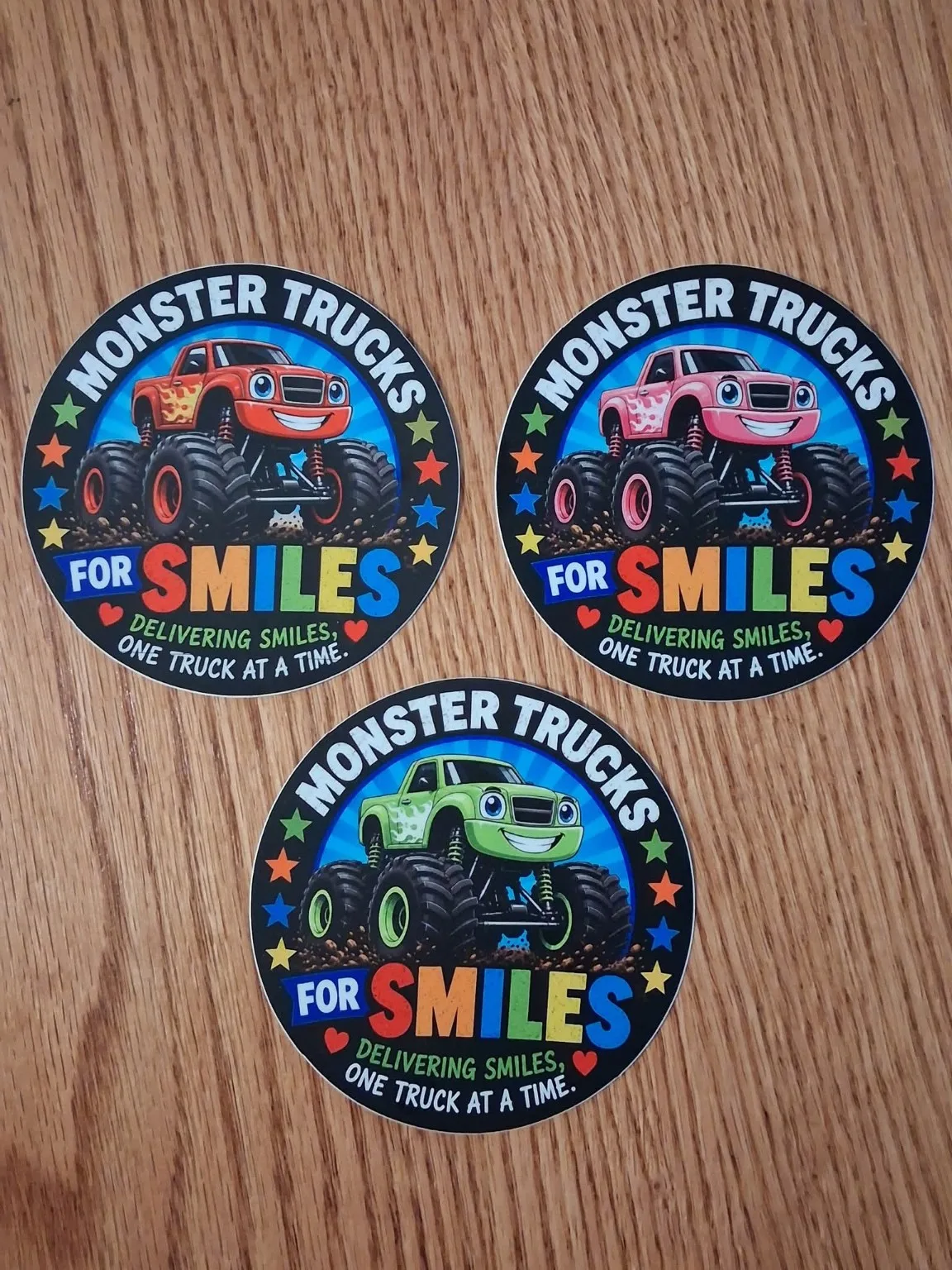 Three current colorful Monster Trucks for Smiles sticker concepts
